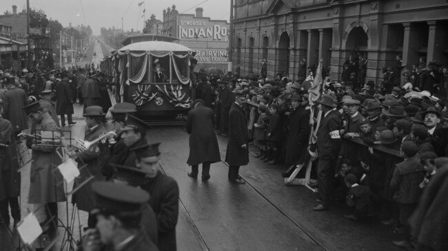 A tram arriving at Glenferrie Rd decked out in ribbons and banners circa 1916-1930. Picture: V. E Charnley (State Library of Victoria)