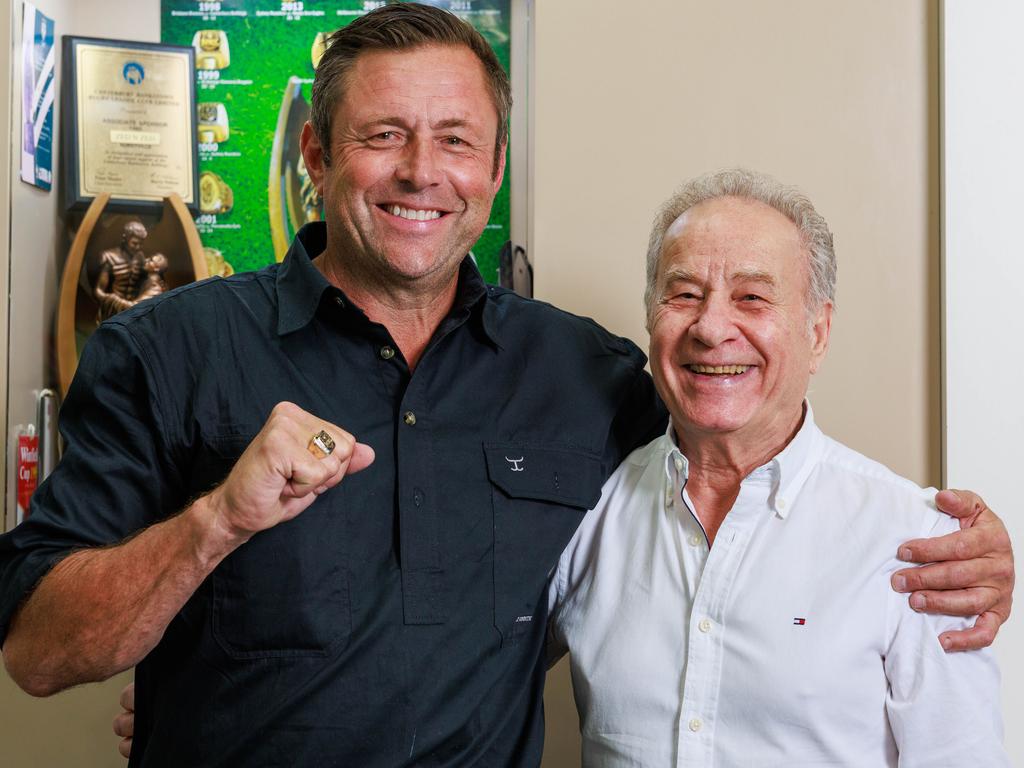 Former Melbourne Storm player Craig Smith with his replacement 1999 premiership ring, and Allan Zreik, at Zed n Zed Jewellers, Hurstville. Picture: Justin Lloyd