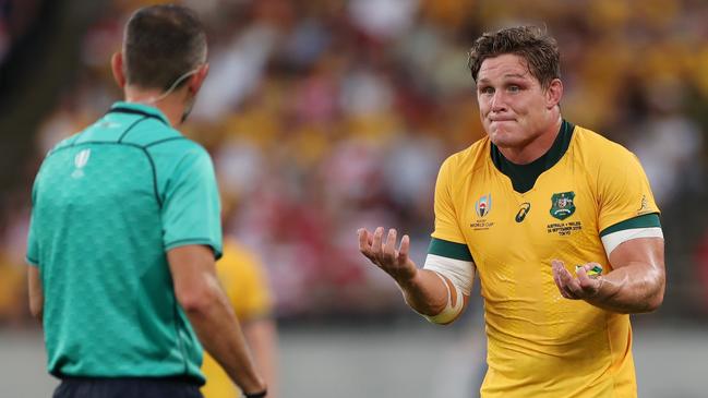 CHOFU, JAPAN - SEPTEMBER 29: Michael Hooper of Australia reacts as he speaks with Match Referee Romain Poite during the Rugby World Cup 2019 Group D game between Australia and Wales at Tokyo Stadium on September 29, 2019 in Chofu, Tokyo, Japan. (Photo by Dan Mullan/Getty Images)