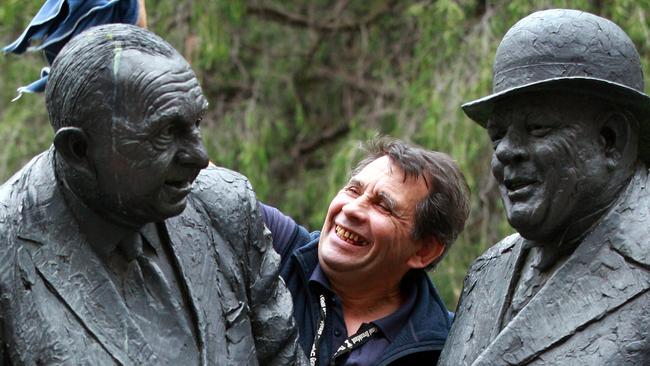 The Sir Henry Bolte statue outside Treasury Place gets a good clean.