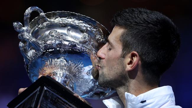 Novak Djokovic of Serbia poses with the Norman Brookes Challenge Cup