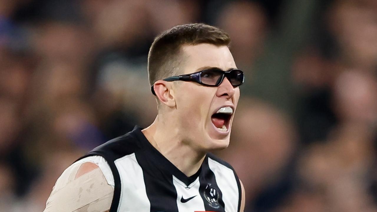 Magpie Mason Cox has worn protective glasses. (Photo by Dylan Burns/AFL Photos via Getty Images)