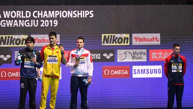 Duncan Scott (R) refuses to be pictured with Sun Yang. Picture: AFP