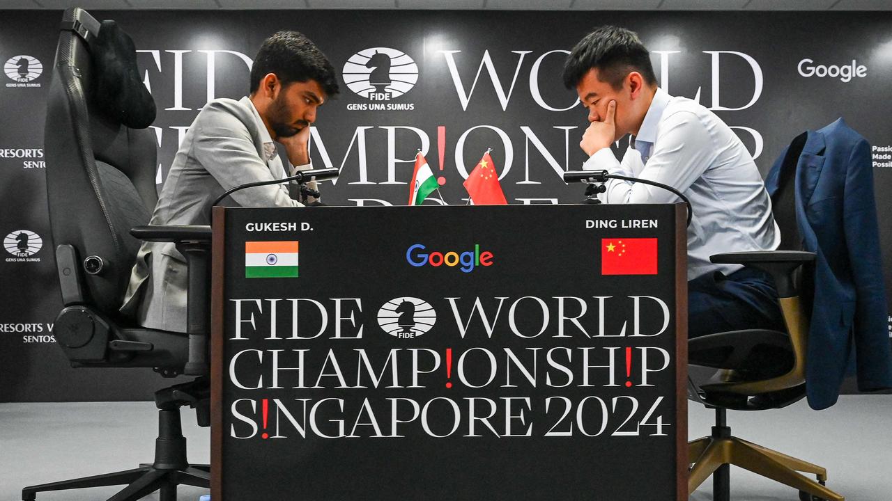 Millions of people are watching the game around the world as the Indian teen takes on the Chinese star in the world chess championship. Picture: AFP