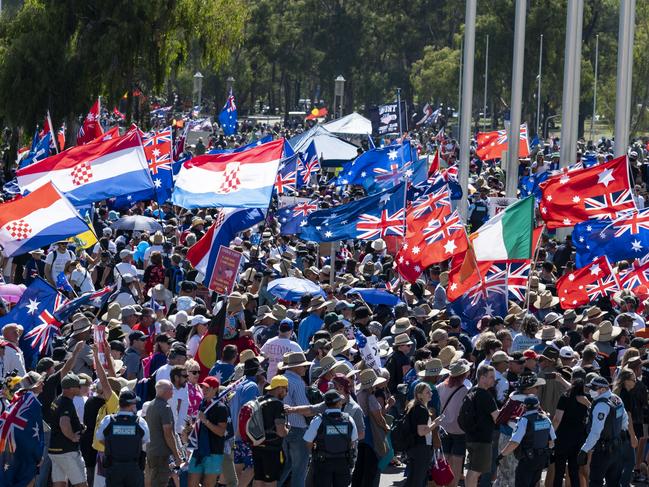 CANBERRA, AUSTRALIA - NewsWire Photos FEBRUARY 12, 2022: Demonstrators against COVID-19 mandates marching to Parliament House, Canberra. Picture : NCA NewsWire / Martin Ollman