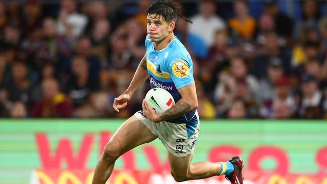 Jayden Campbell of the Titans runs the ball during the round seven NRL match between Gold Coast Titans and Brisbane Broncos at Cbus Super Stadium on April 15, 2023 in Gold Coast, Australia. (Photo by Chris Hyde/Getty Images)