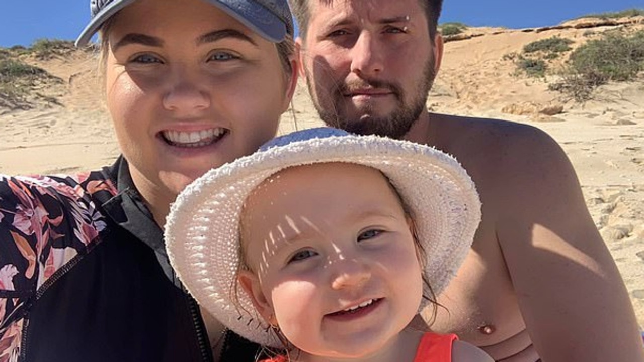 Cleo is pictured with her mother Ellie and stepfather Jake at the beach. Picture: Facebook.