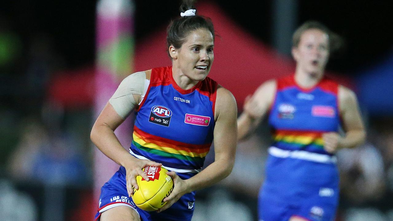 Emma Kearney charges through half forward. Picture: Michael Klein