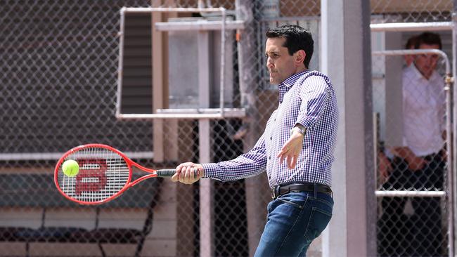 Leader of the Opposition David Crisafulli playing tennis during his tour of Ingham Tennis Court Complex. Picture: Liam Kidston.