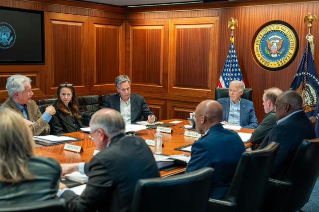 This handout picture courtesy of the White House taken on April 13, 2024 shows US President Joe Biden (C) meeting with members of the National Security team regarding the unfolding missile attacks on Israel from Iran, in the White House Situation Room, in Washington, DC. Iran's Revolutionary Guards confirmed early April 14, 2024 that a drone and missile attack was under way against Israel in retaliation for a deadly April 1 drone strike on its Damascus consulate. US President Joe Biden promised "ironclad" support for Israel against Iranian attacks Saturday, after holding an urgent meeting with his top security officials over the spiraling crisis in the Middle East.