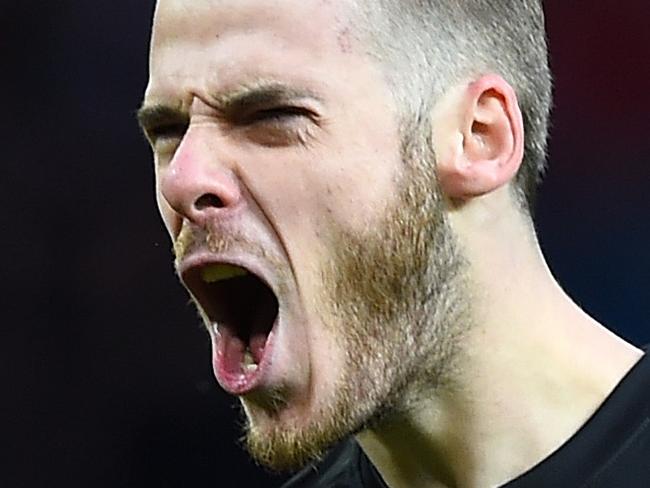 MANCHESTER, ENGLAND - DECEMBER 14: David De Gea of Manchester United celebrates during the Barclays Premier League match between Manchester United and Liverpool at Old Trafford on December 14, 2014 in Manchester, England. (Photo by Shaun Botterill/Getty Images)