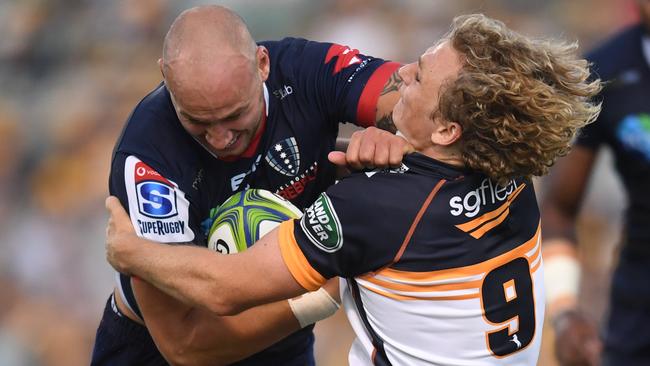 Billy Meakes of the Rebels (left) is tackled by Joe Powell of the Brumbies during the Round 2 Super Rugby match between the ACT Brumbies and the Melbourne Rebels at GIO Stadium in Canberra, Friday, February 7, 2020. (AAP Image/Lukas Coch) NO ARCHIVING, EDITORIAL USE ONLY