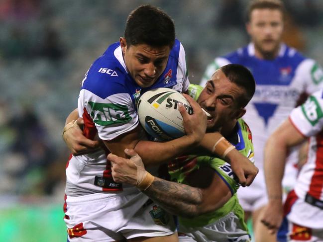 Joseph Tapine as a young Knights player against his future club Canberra. Photo: Kym Smith