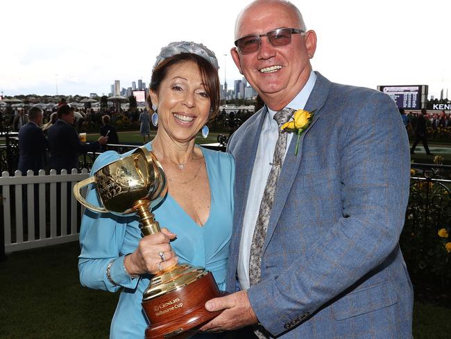 MELBOURNE . 31/10/2022.  RACING.  Melbourne Cup Day races at Flemington racecourse.  Race 7. The Melbourne Cup. (3200 mtr).  Part owner of Gold Trip Noel Greenhalgh and with Maria with the Melbourne Cup    . Picture by Michael Klein