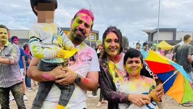 Vivek Bhatia with his youngest son, and Ruchi Bhatia with their eldest son Vihaan.