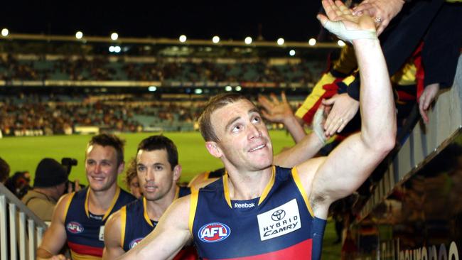 Simon Goodwin celebrates a win with the Adelaide fans.