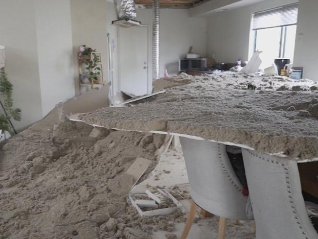 **MUST CREDIT NINE NEWS** A mother and four children are homeless after their ceiling collapsed on a rainy and windy night. The ceiling had collapsed over the dining room table where her four young children were having dinner just hours earlier. Picture: Nine News