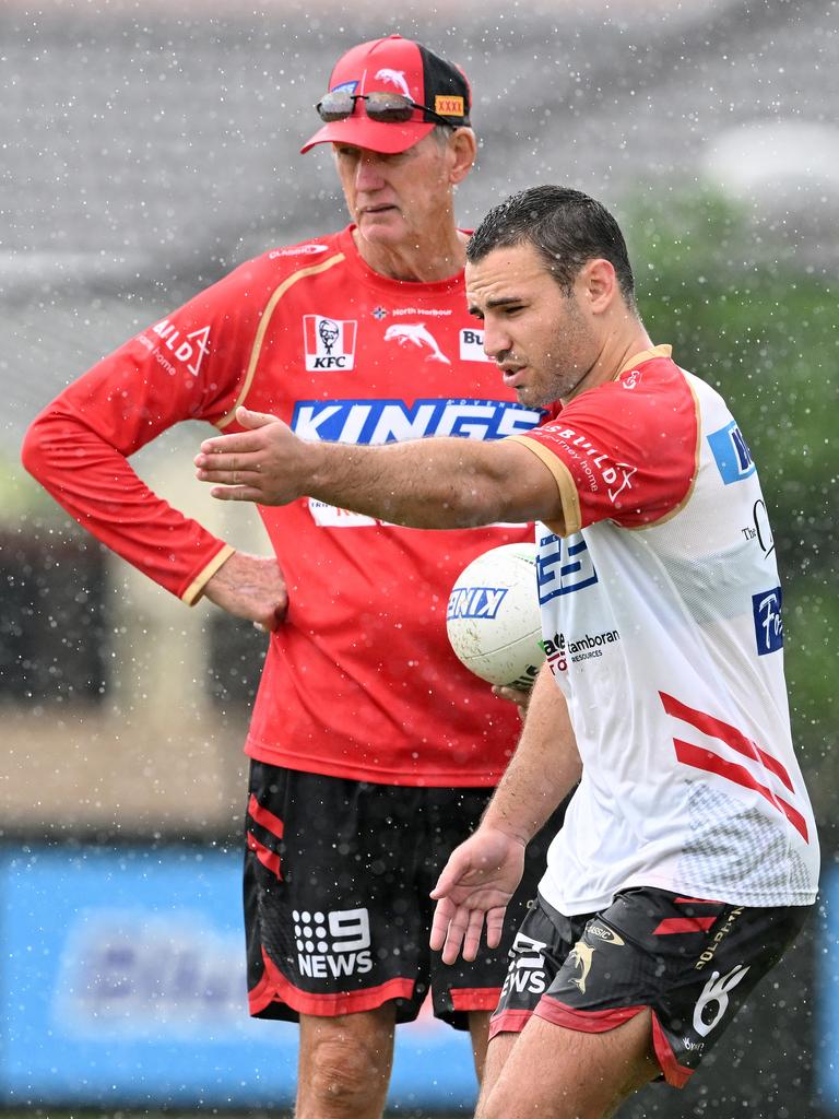 Sean O'Sullivan talks tactics with Coach Wayne Bennett. (Photo by Bradley Kanaris/Getty Images)