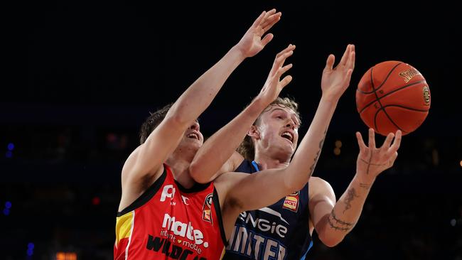 Former Wildcat Luke Travers (right) made his return to Perth to face his old team. Picture: Getty Images