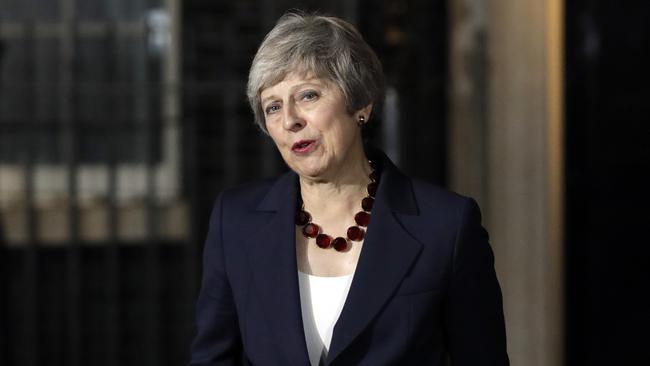 Theresa May outside 10 Downing Street yesterday after the five-hour cabinet meeting to approve her deal. Picture: AP