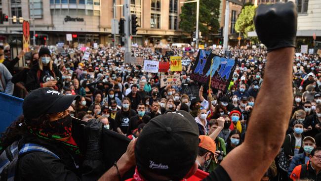 Demonstrators at the Black Lives Matter protest at Town Hall on Saturday. Picture: AFP