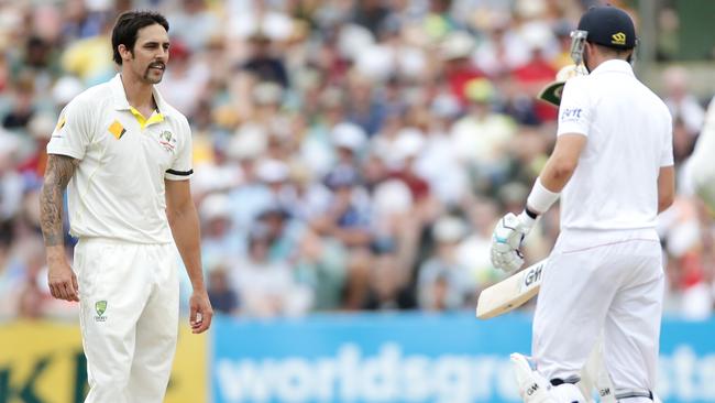 8.12.2013 - Ashes 2nd Test, Australia v England, Adelaide Oval - Day 4. Mitchell Johnson stares at Joe Root. pic Calum Robertson