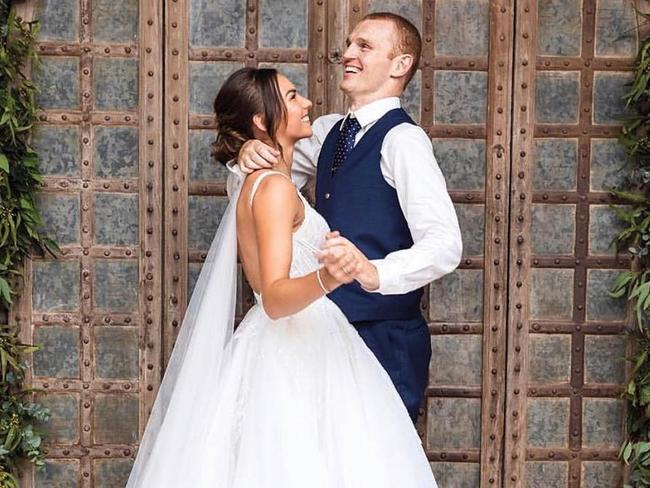 Alex McKinnon defied the odds to stand as he married his partner Teigan. Picture: Instagram