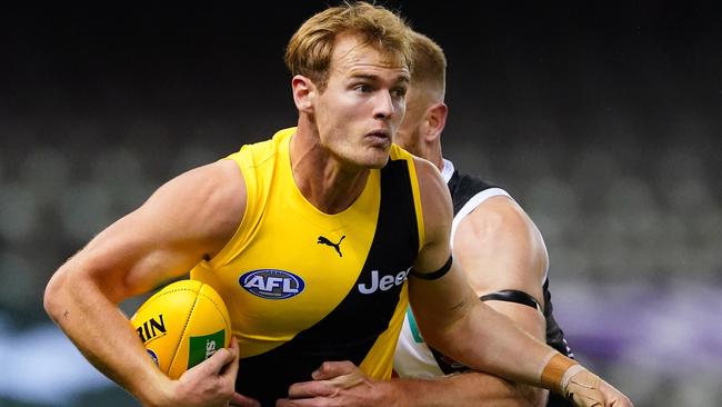 Richmond will be without key defender David Astbury for about a month.