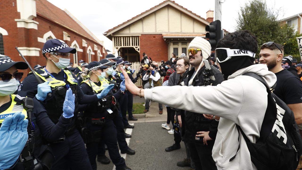 A protester argues with police on Burnley Street, Richmond. (Photo by Darrian Traynor/Getty Images)