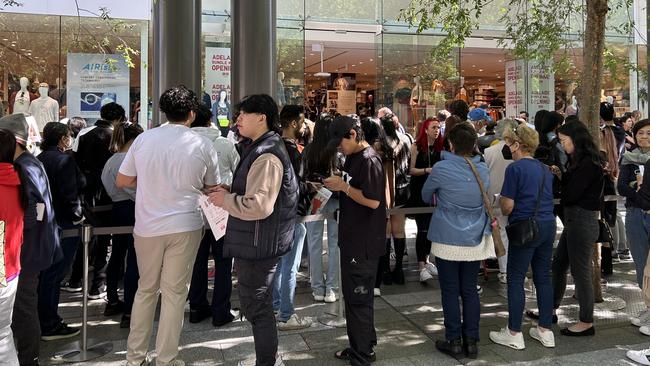 People lining up outside Uniqlo on Rundle Mall, ahead of its grand opening.