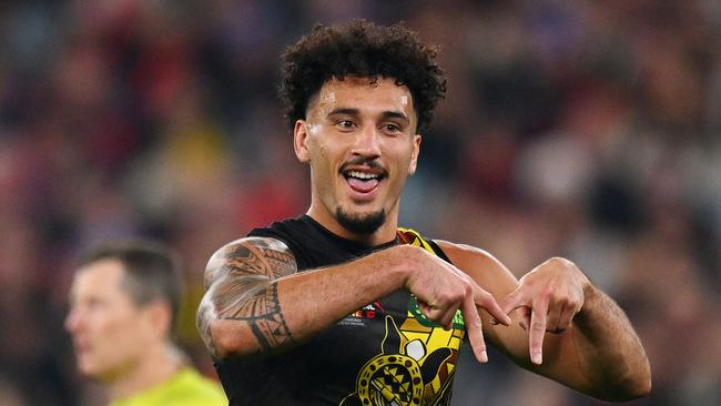 MELBOURNE, AUSTRALIA – MAY 25: Mykelti Lefau of the Tigers celebrates a goal during the round 11 AFL match between Richmond Tigers and Essendon Bombers at Melbourne Cricket Ground, on May 25, 2024, in Melbourne, Australia. (Photo by Morgan Hancock/AFL Photos/via Getty Images)