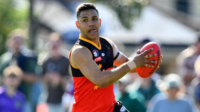 Neville Jetta of the Fitzroy Stars runs with the ball during the 2024 Northern Football Netball League Division 3 Heidelberg Golf Club Seniors Grand Final match between the Fitzroy Stars and the Old Paradians at Lalor Reserve, on September 07, 2024, in Melbourne, Australia. (Photo by Josh Chadwick)