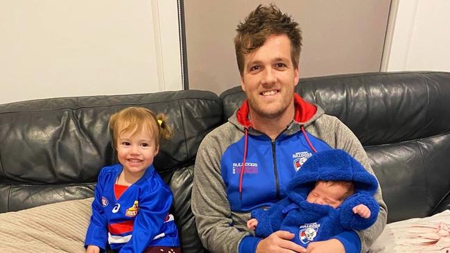 Mitch Williams, 34, with daughters Lila, 3, and Zoe, 1. Picture: Callum Glassford.