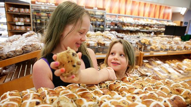 Elliot and Aidan Doble don't mind seeing their hot cross buns early, but do you? Picture: Katrina Tepper