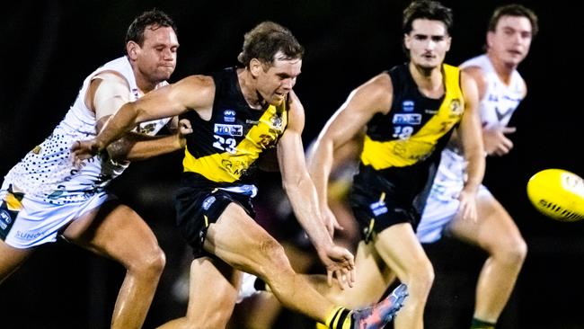 Steven Motlop of PINT chases down Nightcliff's Brodie Filo earlier this season.