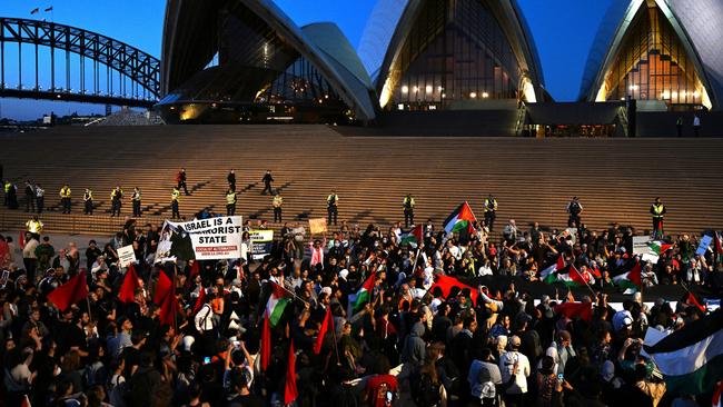 Participants of a Free Palestine rally react outside Sydney Opera House. Picture: Dean Lewins