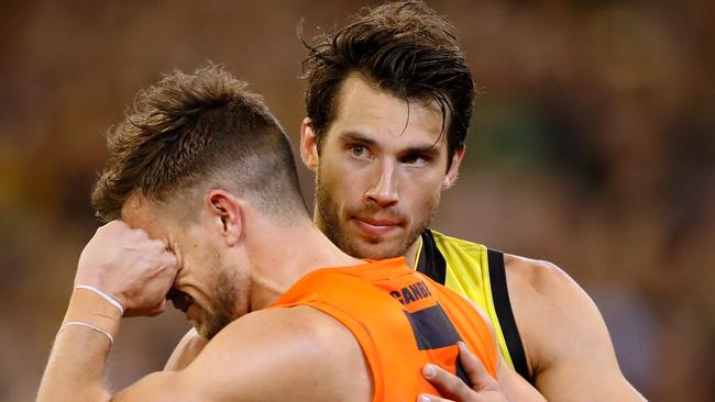 Tiger Alex Rance consoles former teammate Brett Deledio after the two teams’ preliminary final. Picture: Getty Images