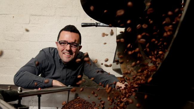 Coffee roaster Dave Makin from Axil Coffee — roasting, preparing and grinding coffee. Picture: Andrew Tauber