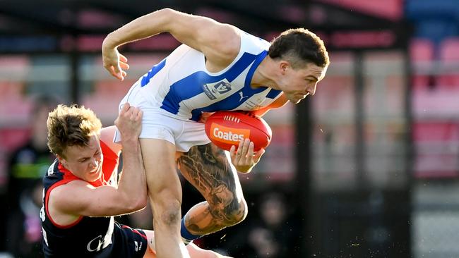 MELBOURNE, AUSTRALIA - AUGUST 27: Sam LowsonÊof the Kangaroos is tackled by James Jordon of the Demons during the 2023 VFL Wildcard Round match between the Casey Demons and the North Melbourne Kangaroos at Casey Fields on August 27, 2023 in Melbourne, Australia. (Photo by Josh Chadwick/AFL Photos)