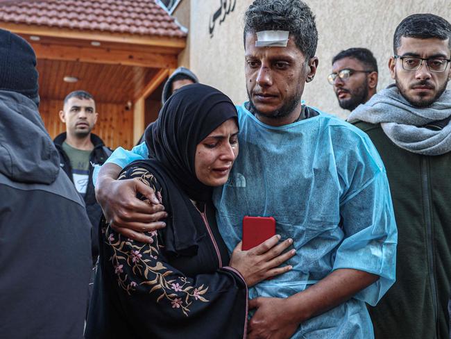 Relatives of Palestinians killed during Israeli bombardment, mourn their loved ones at the European hospital in Khan Yunis in the southern Gaza Strip, on January 6. Picture: AFP