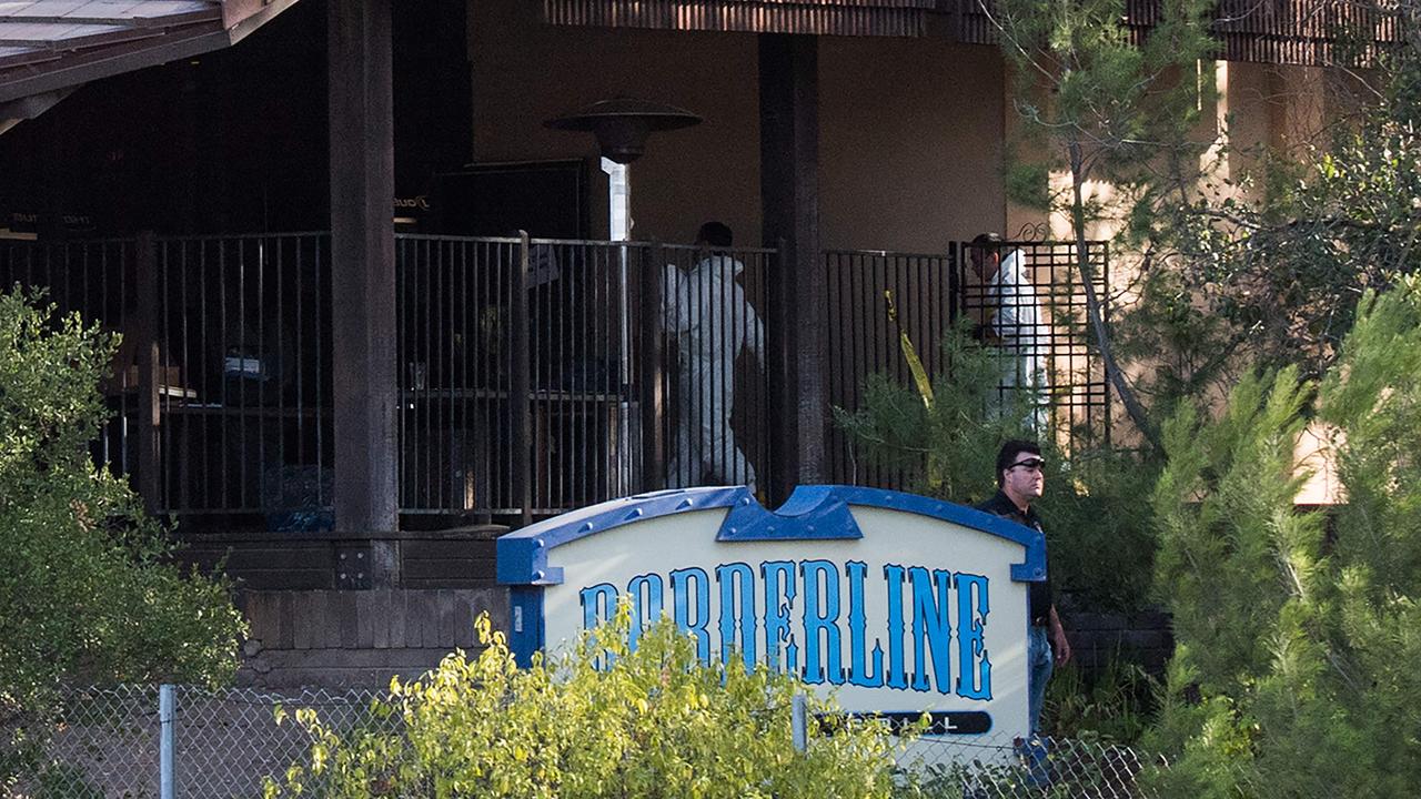 Investigators work at the scene of a mass shooting at the Borderline Bar &amp; Grill in Thousand Oaks, California. Picture: AFP