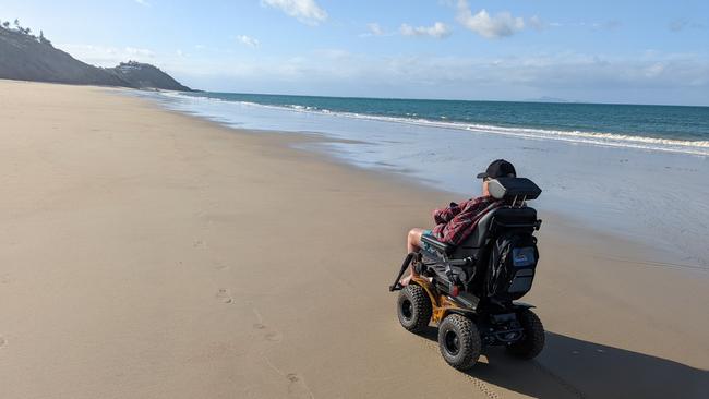 Queensland man Greg Bailey's first time on the beach in 16 years after his stroke left everyone "crying their eyes out". Photo: Contributed