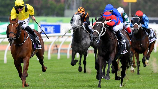 Jockey Tom Marquand rides Addeybb to victory in the Ranvet Stakes on Golden Slipper Day.