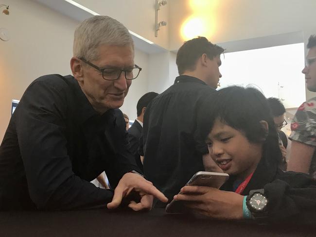 Apple CEO Tim Cook with Yuma’s apps when the two met at Apple’s Worldwide Developers Conference. Picture: Rod Chester