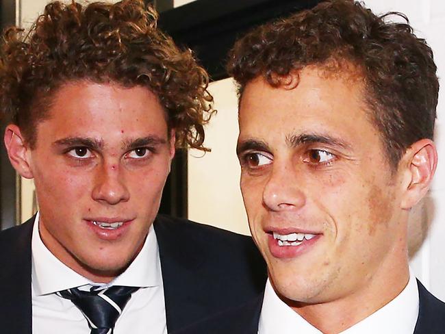 MELBOURNE, AUSTRALIA — MAY 15: Charlie Curnow (L) and brother Ed Curnow of the Carlton Blues leave after their AFL Tribunal Hearing into intentional contact with an umpire at AFL House on May 15, 2018 in Melbourne, Australia. Both escaped suspension. (Photo by Michael Dodge/Getty Images)