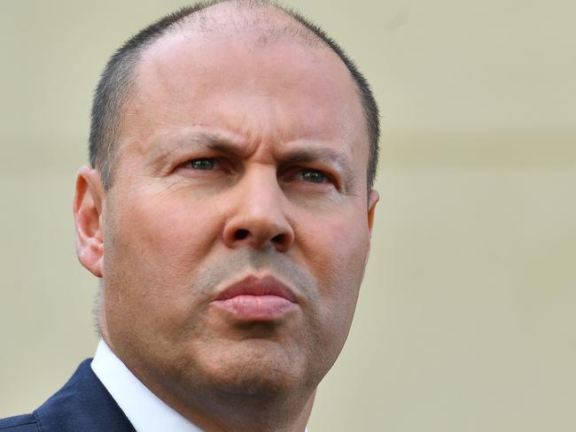 CANBERRA, AUSTRALIA - FEBRUARY 23: Treasurer Josh Frydenberg during a press conference in the Senate Courtyard at Parliament House on February 23, 2021 in Canberra, Australia. Facebook has previously banned publishers an users in Australia from posting it sharing news content as the Australian government prepares to pass laws that will require social media companies to pay news publishers for sharing using content on their platforms.  (Photo by Sam Mooy/Getty Images)