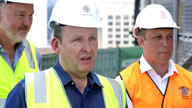 Star chief executive Robbie Cooke with Queensland deputy premier Steven Miles at its Brisbane development in February. Picture: Steve Pohlner