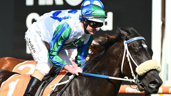 MELBOURNE, AUSTRALIA - SEPTEMBER 23: Luke Nolen riding I Wish I Win gallops alongside Boogie Dancer in between races during Melbourne Racing at Caulfield Racecourse on September 23, 2023 in Melbourne, Australia. (Photo by Vince Caligiuri/Getty Images)