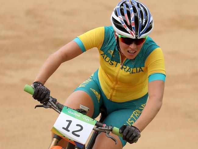 RIO DE JANEIRO, BRAZIL - AUGUST 20: Rebecca Henderson of Australia races during the Women's Cross-Country Mountain Bike Race on Day 15 of the Rio 2016 Olympic Games at the Mountain Bike Centre on August 20, 2016 in Rio de Janeiro, Brazil. (Photo by Christian Petersen/Getty Images)