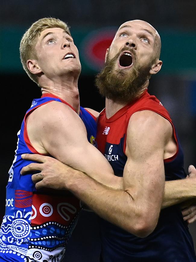 Melbourne captain Max Gawn (right) clashes with Western Bulldogs ruckman Tim English last night. Picture: Getty Images